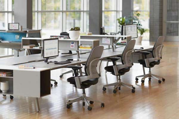Multiple office chairs in a desk group