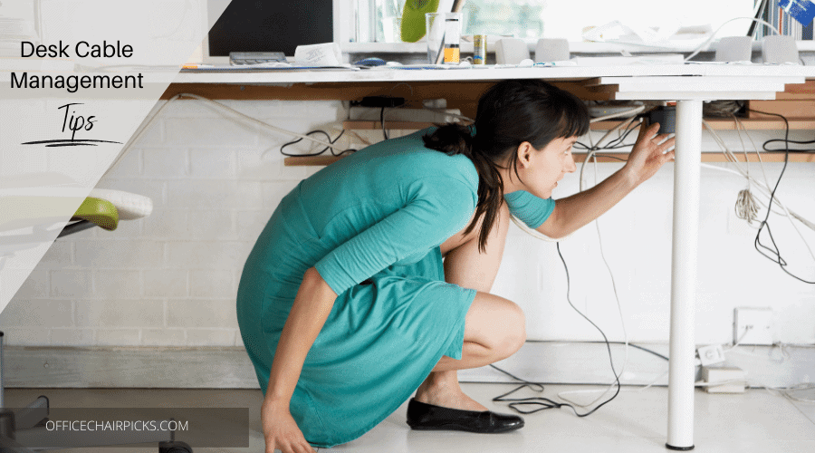 Woman under desk managing cables