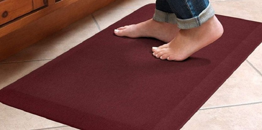 person standing on anti fatigue mat