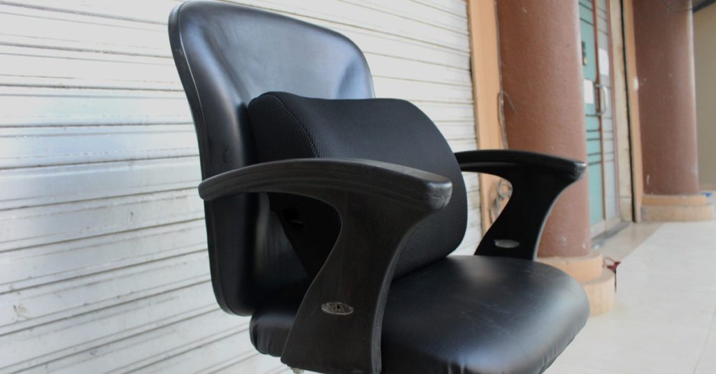 Memory foam lumbar support in office chair outside the office area